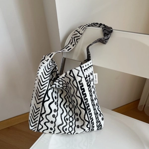 Bohemian linen shoulder bag with black ethnic print and simple wish label
