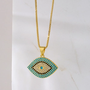 Golden box chain necklace with evil eye pendant featuring blue and white crystals