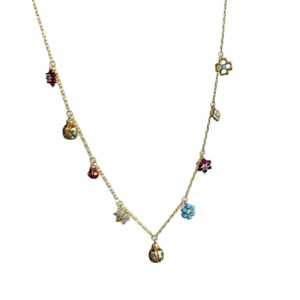 Golden necklace featuring zircon ladybug, flower, and star charms on a delicate fine chain