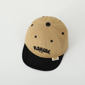 Detail of FLORIDA 1845 3D embroidery on two-tone khaki and black cotton kids baseball cap