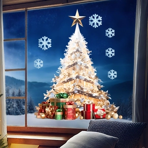 Detail view of festive Christmas tree and blue snowflake static window clings on glass