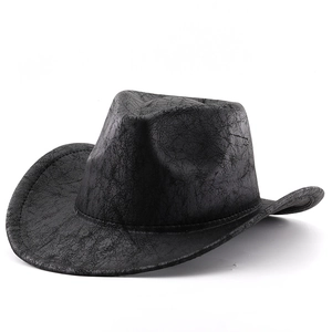 Detailed view of black cowboy hat with vintage cracked texture and curved brim style