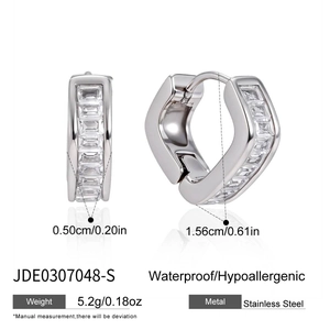 Detailed view of stainless steel hoop earrings with rectangular zircon stone inlay