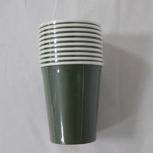 Detailed view of stacked green disposable paper cups with white rolled rims for parties