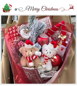 Detailed Christmas bouquet with plush bears and festive decorations in red paper wrap