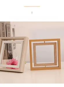 Close-up of rotating double-sided wooden photo frame with natural grain and sleek nested design