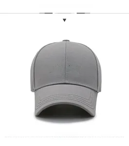 Detail of grey baseball cap showing 3D black NLSFASHION embroidery and fabric texture