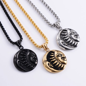 Vintage Yin Yang Sun and Moon pendant necklace in black, gold, and silver finishes