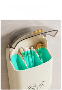 Detail of wall-mounted cutlery organizer with three compartments and a dust-proof lid