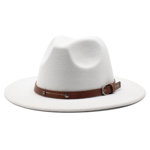 Close-up of white wide brim fedora with brown leather band and metal buckle detail
