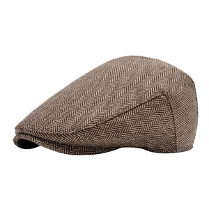 Classic men's brown herringbone tweed newsboy cap with a vintage flat brim style