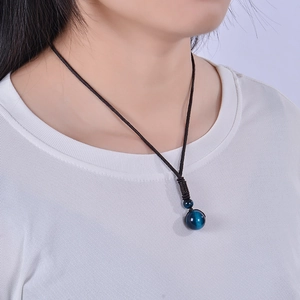 Minimalistische 16mm blauwe tijgeroog hanger ketting met bruin handgevlochten koord