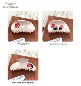 Detailed views of cream floral hair claws with red roses and elegant golden leaves