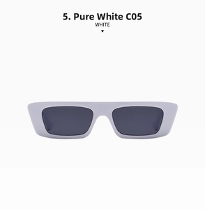Detail view of solid white rectangular sunglasses with thick frames and dark lenses