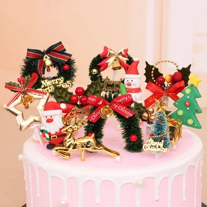 Christmas cake toppers featuring Santa, spotted deer, and festive tree decorations