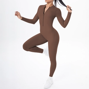 Detail of long sleeve brown bodysuit featuring front zipper and high-stretch fabric texture