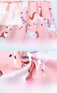 Detail of pink combed cotton fabric with unicorn print and professional stitching