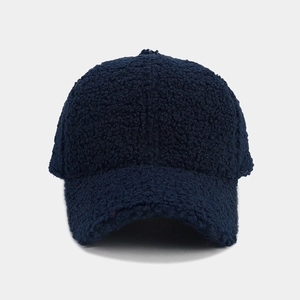 Detailed close-up showing the soft navy blue fleece texture of this warm winter baseball cap