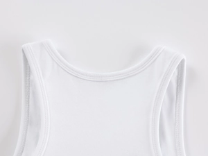 Close-up of white ribbed knit sports tank top neckline and shoulder strap details