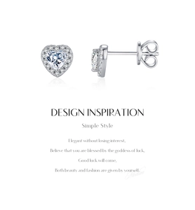 Close-up of heart-shaped S925 silver earrings with D color moissanite stones