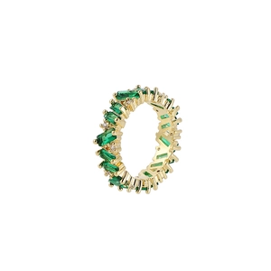 Macro detail of 18K gold plated ring featuring an emerald-cut green zircon and small diamonds