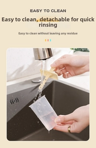 Detail showing the detachable ice cream mold being rinsed under a water tap for easy cleaning