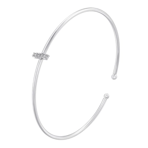 Detail shot of silver adjustable open bangle featuring a bar set with four clear cubic zirconia