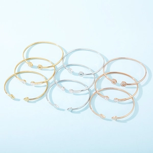 Bracelets ouverts en acier titane avec diamants en or argent et or rose poli