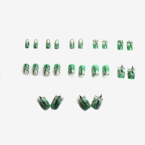 Short square emerald green gradient press-on nails with black leaf patterns and gold glitter