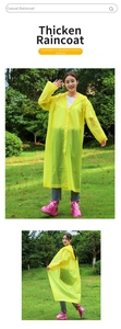 Detailed view of thick yellow EVA raincoat with hood and snap buttons for outdoor use
