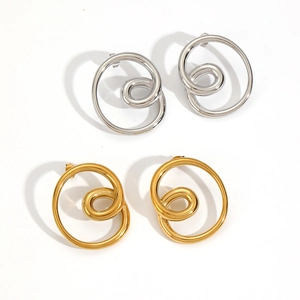 Two-tone silver and gold stainless steel spiral earrings in a minimalist swirl design