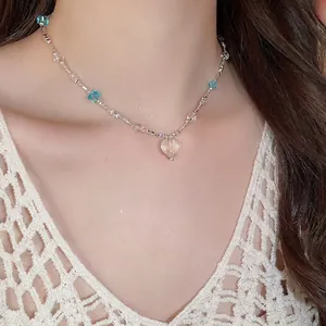 Starfish sea shell heart glass bead necklace with light blue facets on silver chain