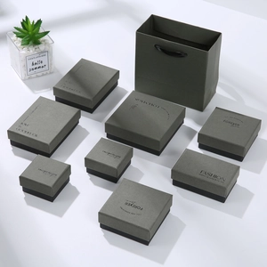 Detailed view of elegant gray jewelry packaging box collection for rings, earrings and necklaces