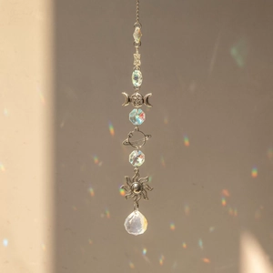 Silver celestial suncatcher with moon and star metal accents and crystal prism ball