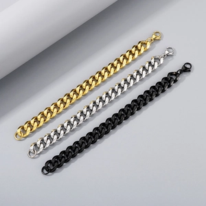 Detailed view of hip hop curb chains in gold, silver, and black with lobster clasps