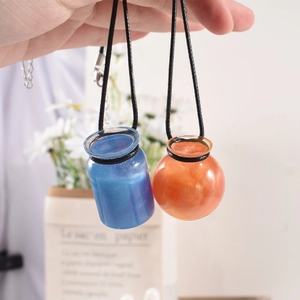Epoxy resin drifting bottle and spherical pendants with glitter and black cords