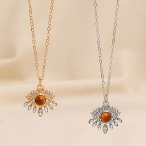 Retro Evil Eye necklace with tiger eye stone and crystal droplets in gold and silver