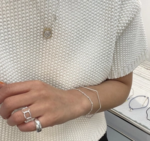 Chic S925 sterling silver hexagonal geometric bracelet styled with minimalist jewelry pieces