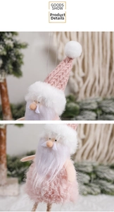 Close-up of pink knitted hat and white faux fur beard on gnome Christmas ornament