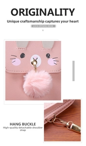 Detail of pink cartoon crossbody bag with gold metal buckle and detachable shoulder strap