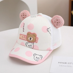 Detail of pink polka dot kids baseball cap with breathable mesh and cute 3D bear ears