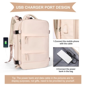 Detail view of pink backpack showing integrated USB charging port and usage steps