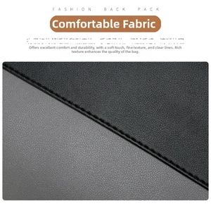 Detailed macro view of soft pebble grain PU leather texture and stitching on black backpack