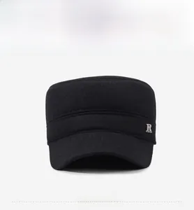 Detailed front view of black winter flat top cap with metallic R logo and SPORT text