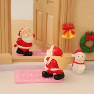 Miniature Christmas resin figurine set featuring Santa Claus, snowman and welcome mats