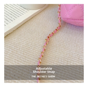 Detail of adjustable gold chain strap on pink quilted crossbody bag for kids