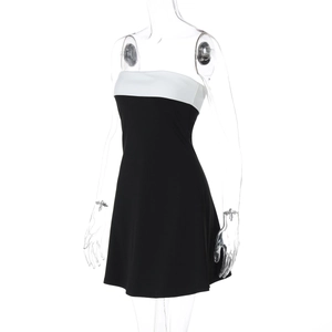 Front view of sleeveless bodycon mini dress featuring black and white contrast stitching