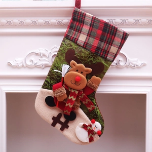 Festive Christmas stockings with plaid patterns, elk and snowman on a white fireplace