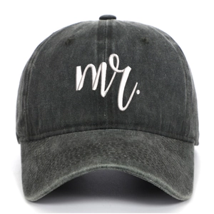 Detail of grey washed cotton baseball cap with 3D white embroidered mr text