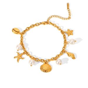 Gold ocean bracelet featuring white pearls, starfish, and seashell charms for beachwear